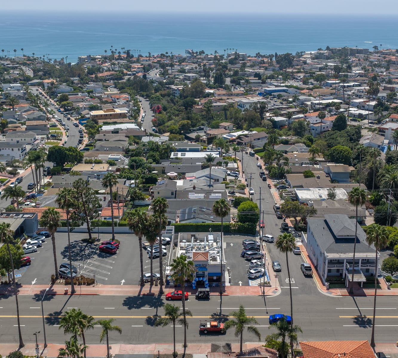Aerial view of a neighborhood and shopping area