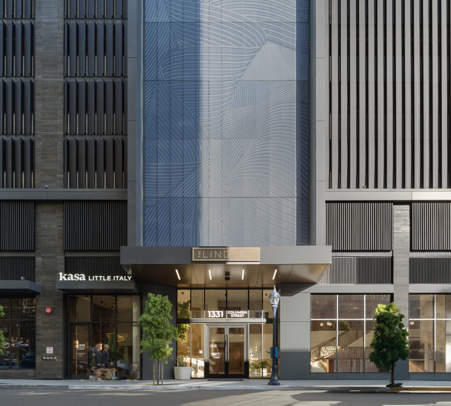 Front entrance to The Lindley at 1331 Columbia St as seen from the street with Kasa Little Italy restaurant to the left of the main doors.