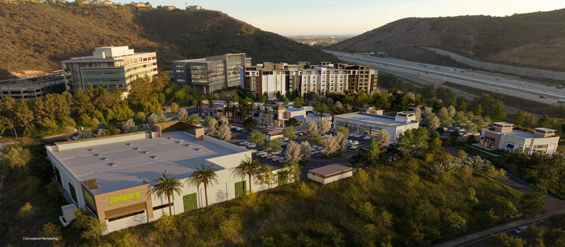 Aerial rendering if a shopping complex overlooking a freeway at dusk