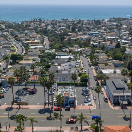 Aerial view of a neighborhood and shopping area