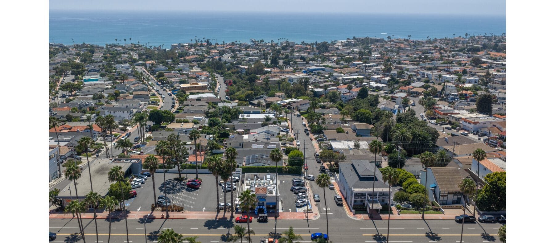 Aerial view of a neighborhood and shopping area