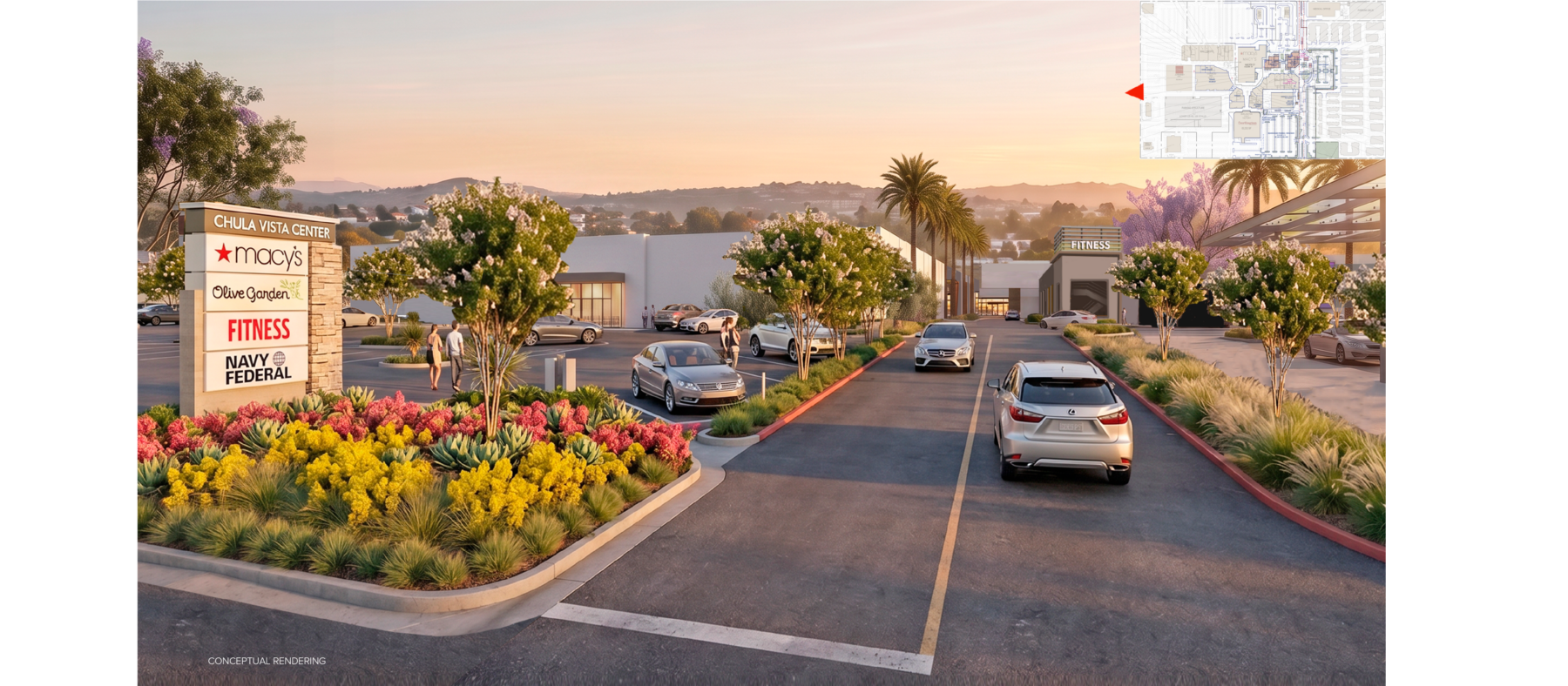 Rendering of a shopping center at dusk from an aerial view