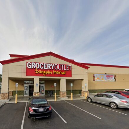 Facade of Grocery Outlet at 2001 Whittier Blvd with parking in front.
