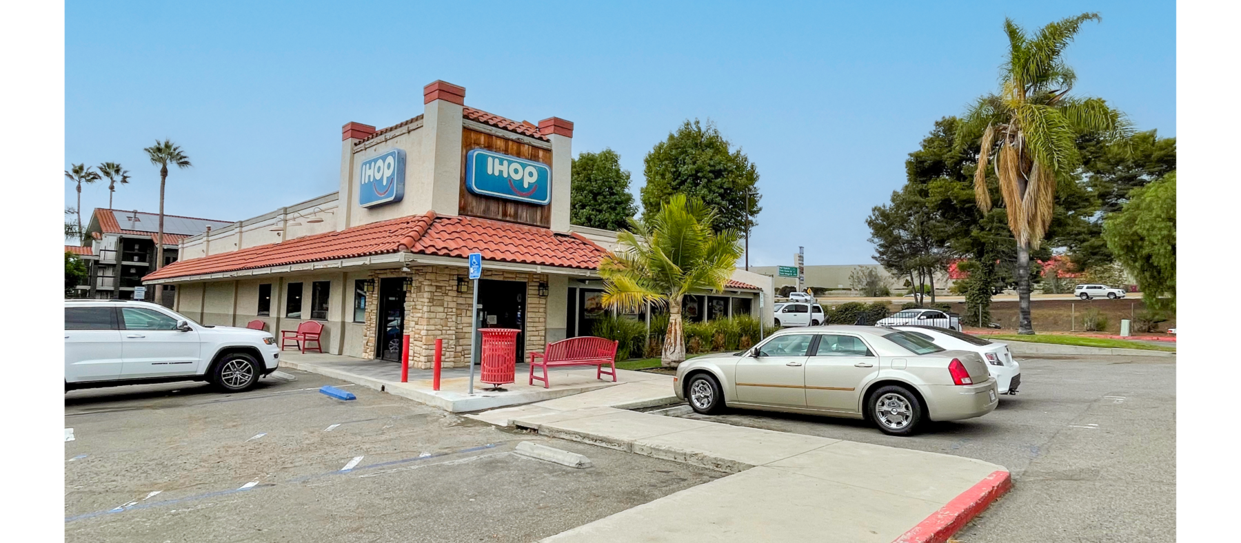 The former IHOP building at 632 Sycamore Ave and the adjacent parking spaces.