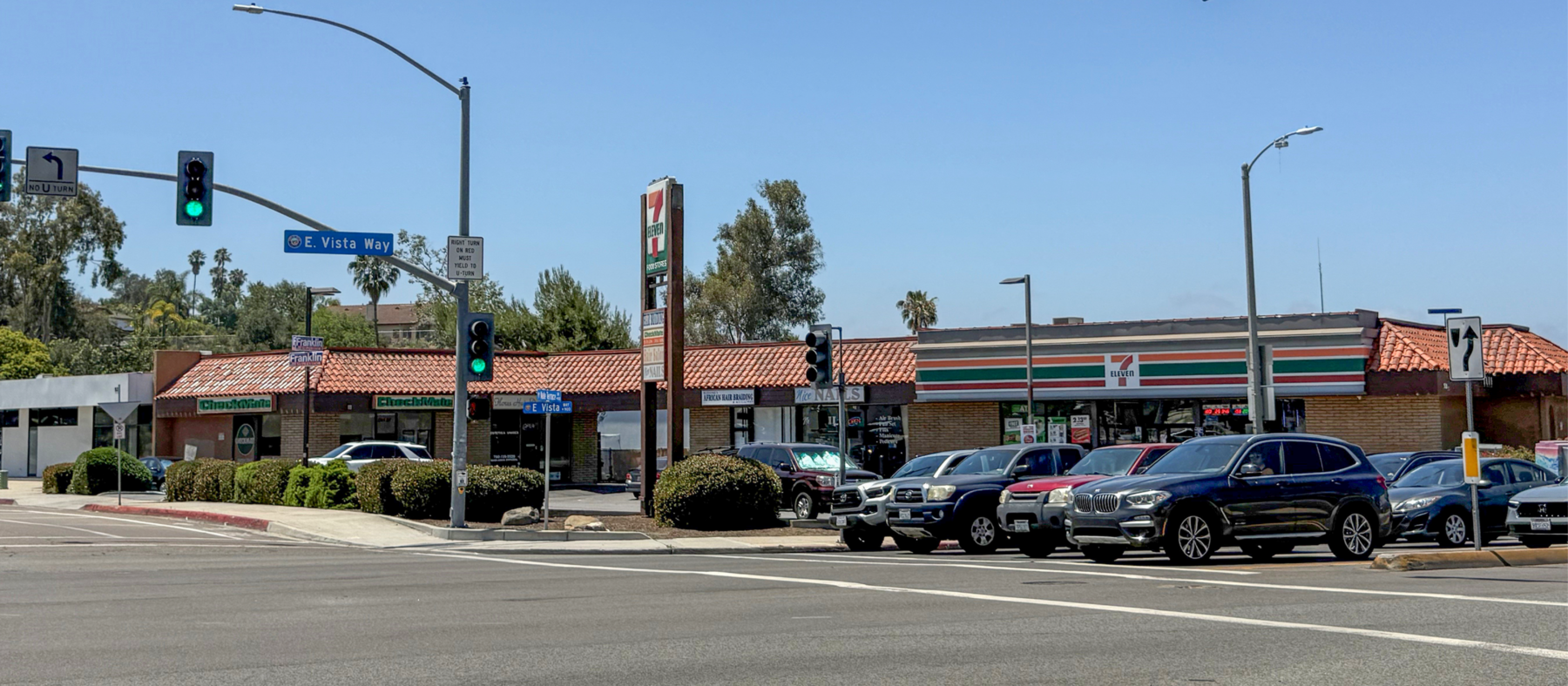 895 E Vista Way and the SWC of E Vista Way and Vale Terrace Dr viewed from the signalized intersection.
