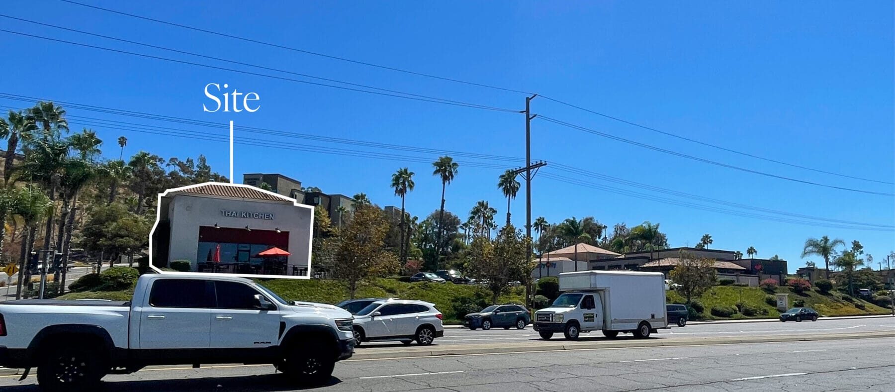 The freestanding building for lease at 1101 W Valley Pkwy viewed from the road.